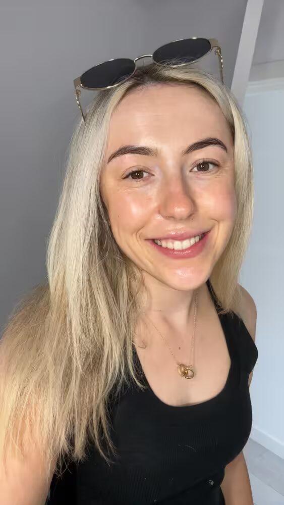 Client selfie showing beautiful skin after visiting Skin by Emma