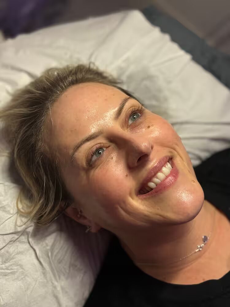 Happy client after a skin treatment at Skin by Emma